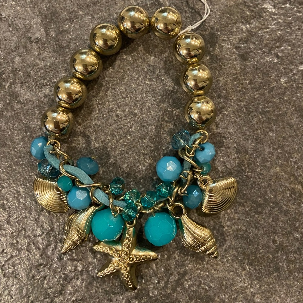 Charming Charlie Seashell Bracelet gold ball, teal and aqua beads, gold charms